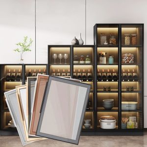 Sample cabinet door finishes displayed in front of a lit storage cabinet with wine and dishes
