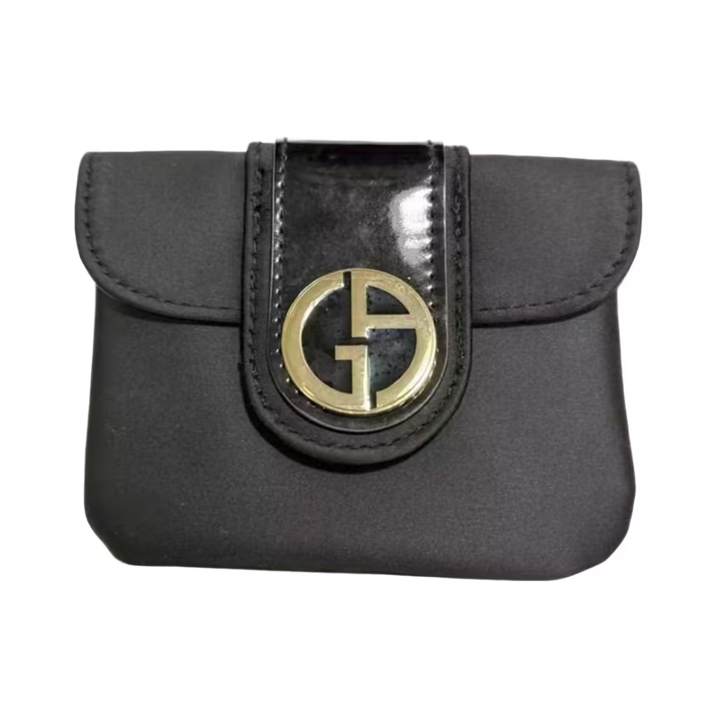 Searching for a sleek black makeup pouch that combines minimalist design with convertible functionality?