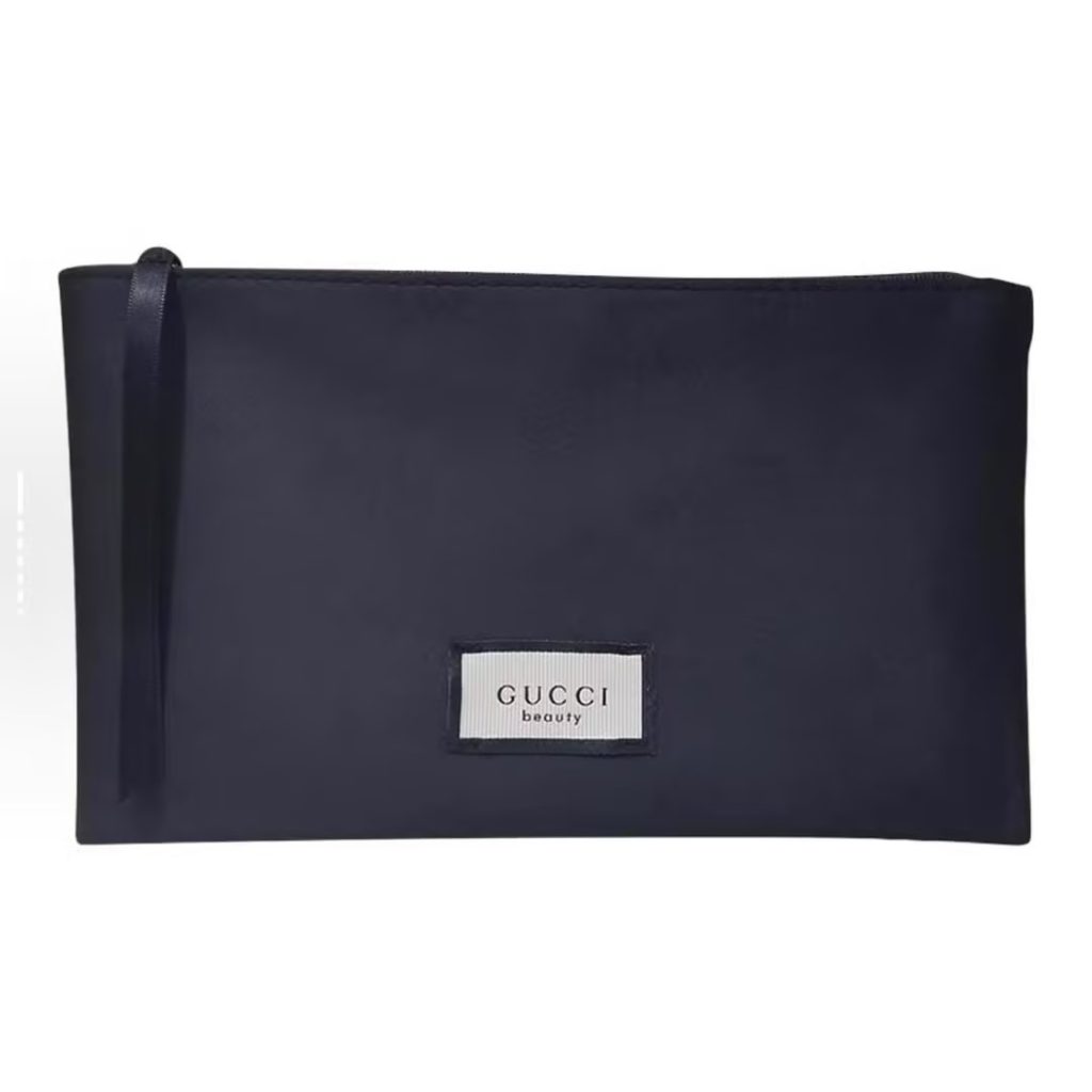 Need a black gucci cosmetic bag in satin for your brand's premium accessory line?